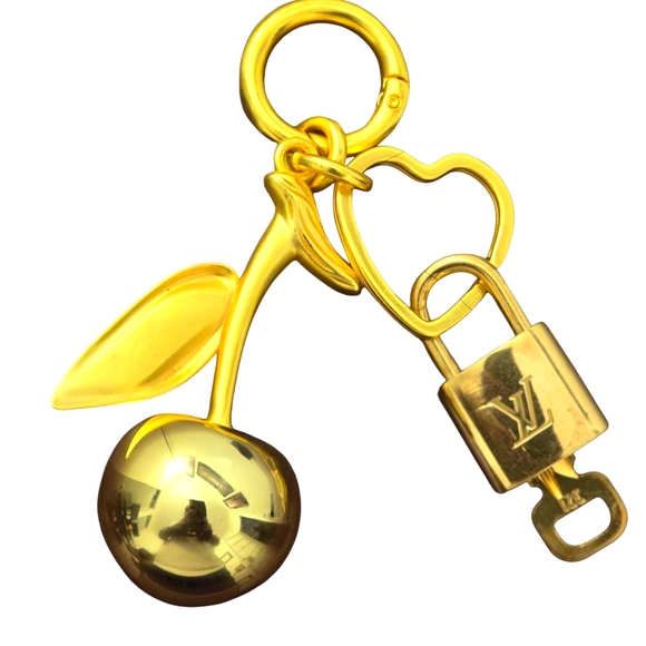 Louis Vuitton Accessories - Louis Vuitton Lock and Key Charm with gold colored cherry and heart